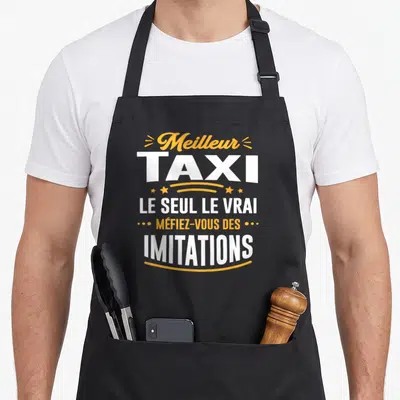Tablier de cuisine noir avec inscription Meilleur Taxi le seul le vrai et Méfiez-vous des imitations en blanc et orange.