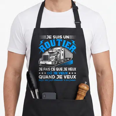 Tablier de cuisine noir avec illustration de camion et texte Je suis un routier en bleu et blanc.