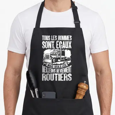 Tablier de cuisine noir avec inscription Tous les hommes sont égaux et illustration de camion en blanc.