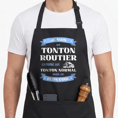 Tablier de cuisine noir avec inscription Je suis un tonton routier comme un tonton normal mais en plus cool et dessin de semi-remorque.