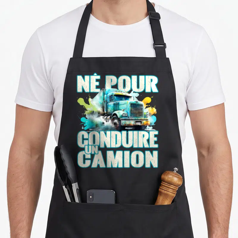 Tablier de cuisine noir avec illustration de camion turquoise et texte blanc né pour conduire un camion