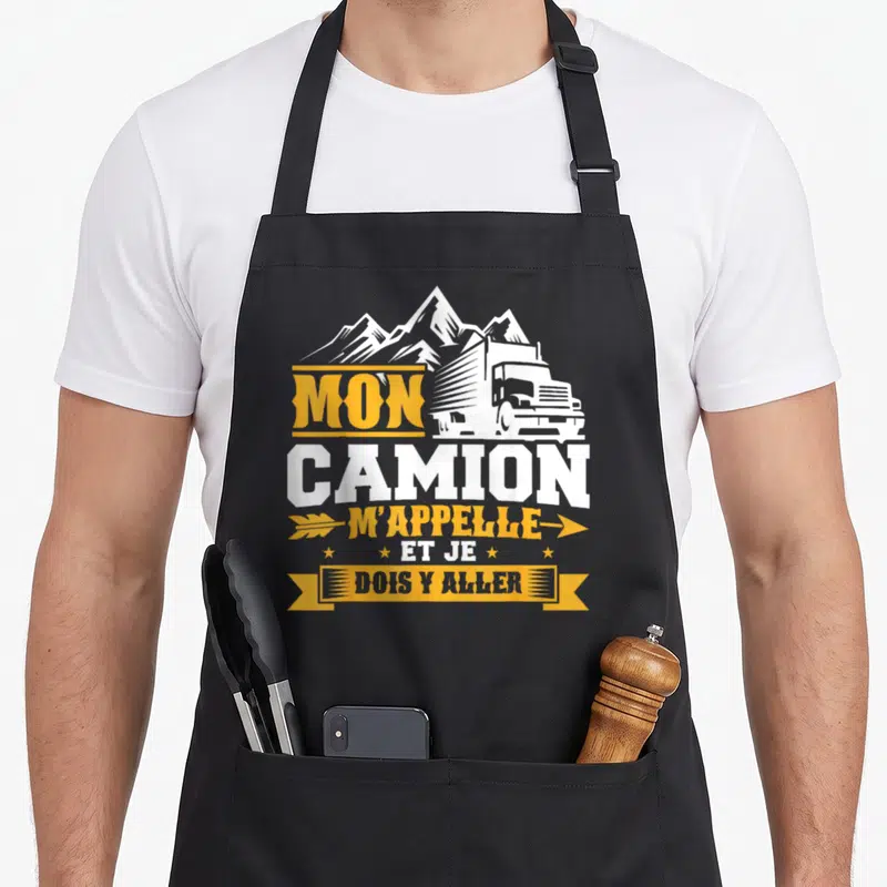 Tablier de cuisine noir avec illustration de truck blanc, montagnes et texte jaune Mon camion m'appelle et je dois y aller
