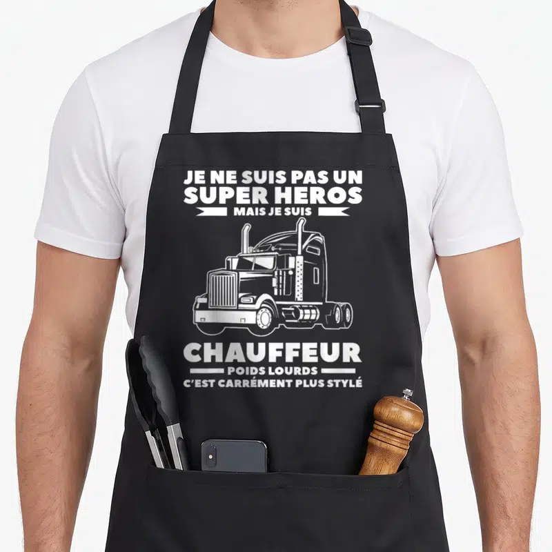 Tablier de cuisine noir avec illustration de camion et texte blanc Je ne suis pas un super héros mais je suis chauffeur poids lourds.