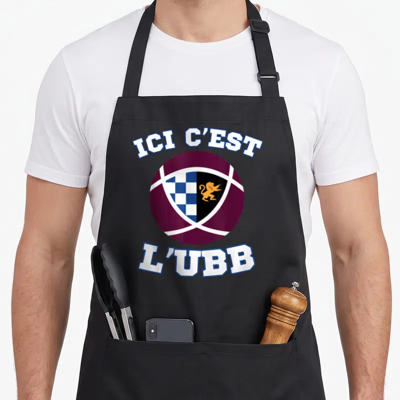 Tablier de cuisine noir avec le logo UBB Bordeaux et l'inscription Ici C'est L'UBB en lettres blanches.