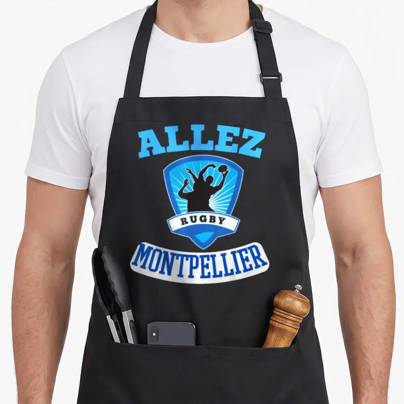 Tablier de cuisine noir avec logo Allez Rugby Montpellier silhouette joueur écusson bleu