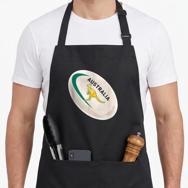 Tablier de cuisine noir avec motif ballon de rugby blancAUSTRALIA et kangourou jaune stylisé