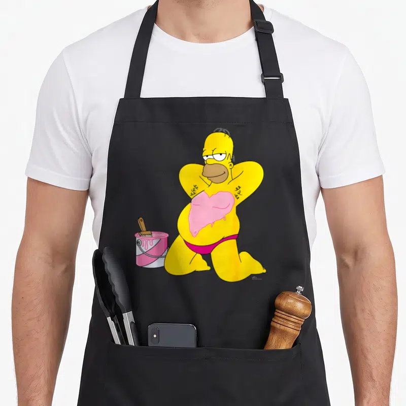Tablier de cuisine noir avec Homer Simpson peignant un cœur rose à côté d'un pot de peinture