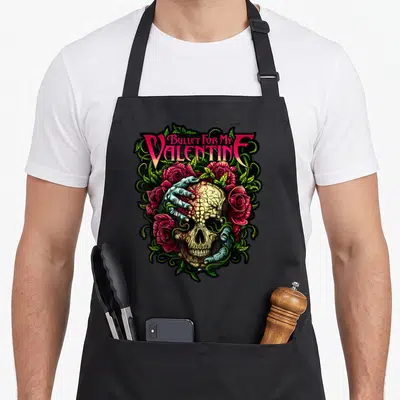 Tablier de cuisine noir avec un crâne, des mains bleutées et des roses rouges sous le logo Bullet For My Valentine.