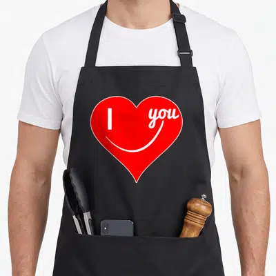 Tablier de cuisine noir avec un grand cœur rouge stylisé portant les mots I you en blanc.
