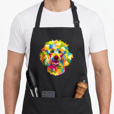 Tablier de cuisine noir avec tête de caniche aux couleurs vives style pop art.