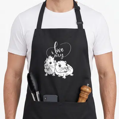 Tablier de cuisine noir avec illustration blanche de deux cochons d'Inde et texte i love my au-dessus.