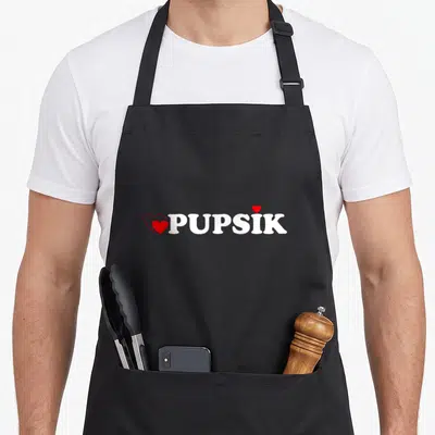 Tablier de cuisine noir avec linscription Pupsik en blanc et deux cœurs rouges stylisés.