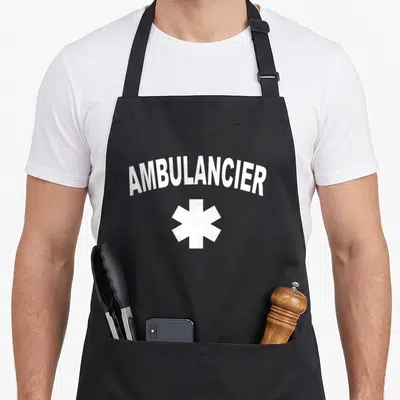 Tablier de cuisine noir avec inscription AMBULANCIER et symbole d'étoile à six branches en blanc au centre.
