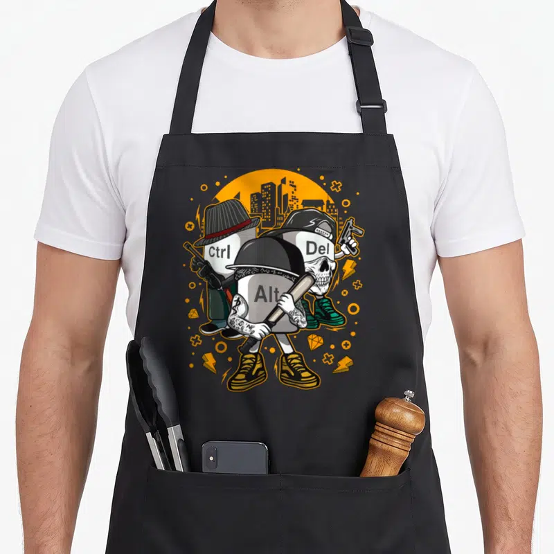 Tablier de cuisine noir avec trois touches clavier stylisées en personnages urbains armés sur fond orange.