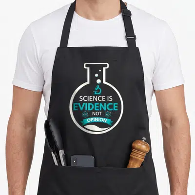 Tablier de cuisine noir avec illustration de bécher scientifique et texte en blanc et turquoise.