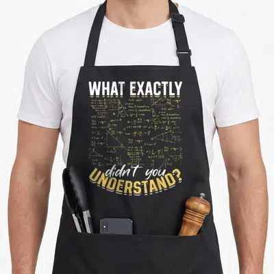 Tablier de cuisine noir avec l'inscription What exactly didn't you understand sur fond d'équations mathématiques jaunes.