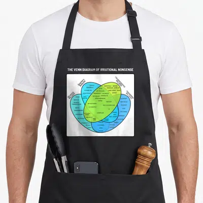 Tablier de cuisine noir avec un diagramme de Venn coloré listant des croyances irrationnelles et pseudosciences.