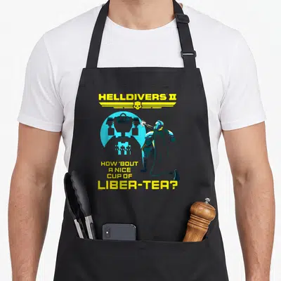 Tablier de cuisine noir avec soldat Helldivers II et texte jaune How 'bout a nice cup of liber-tea.