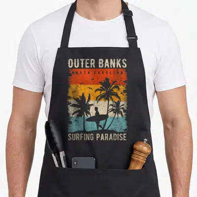 Tablier de cuisine noir avec motif vintage Outer Banks North Carolina Surfing Paradise palmiers et silhouette de surfeur