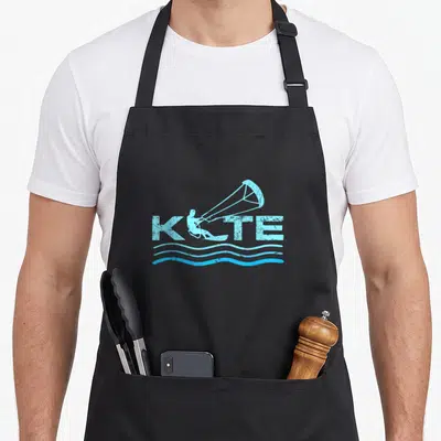 Tablier de cuisine noir avec logo KITE bleu clair représentant un kitesurfeur et des vagues stylisées en bas.