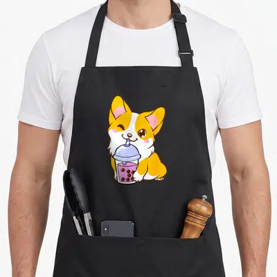 Tablier de cuisine noir avec un corgi kawaii tenant une tasse de boba rose.