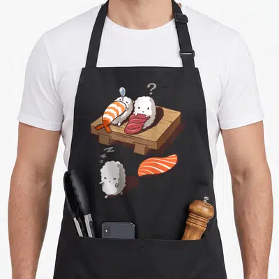 Tablier de cuisine noir avec illustration d'un sushi somnambule laissant son compagnon étonné sur une planche en bois.