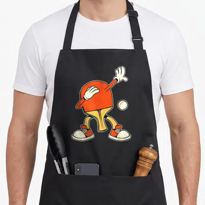 Tablier de cuisine noir avec une raie de ping-pong orange aux jambes et gants blancs style cartoon.