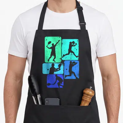Tablier de cuisine noir avec silhouettes de joueurs de tennis sur rectangles turquoise et bleus aux effets délavés.