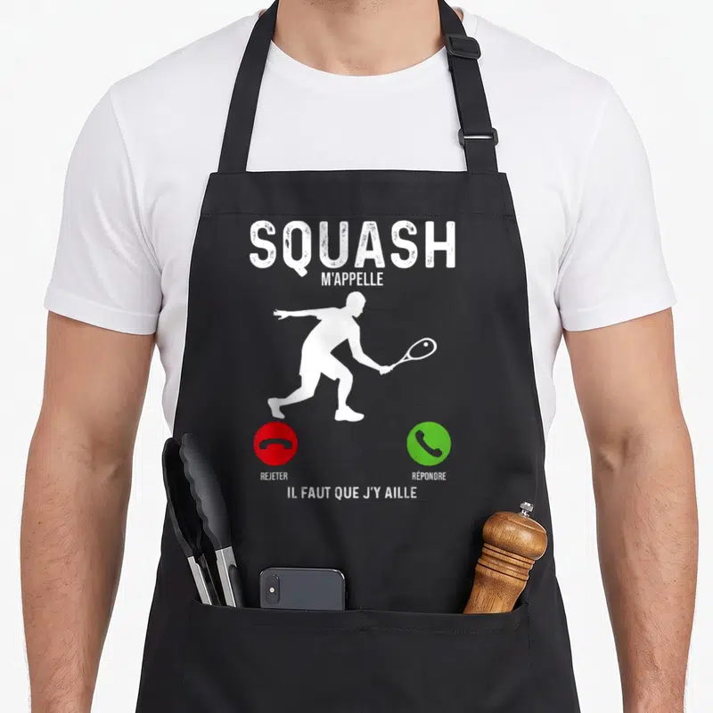 Tablier de cuisine noir avec silhouette joueur squash et texte Squash m'appelle Il faut que j'y aille.