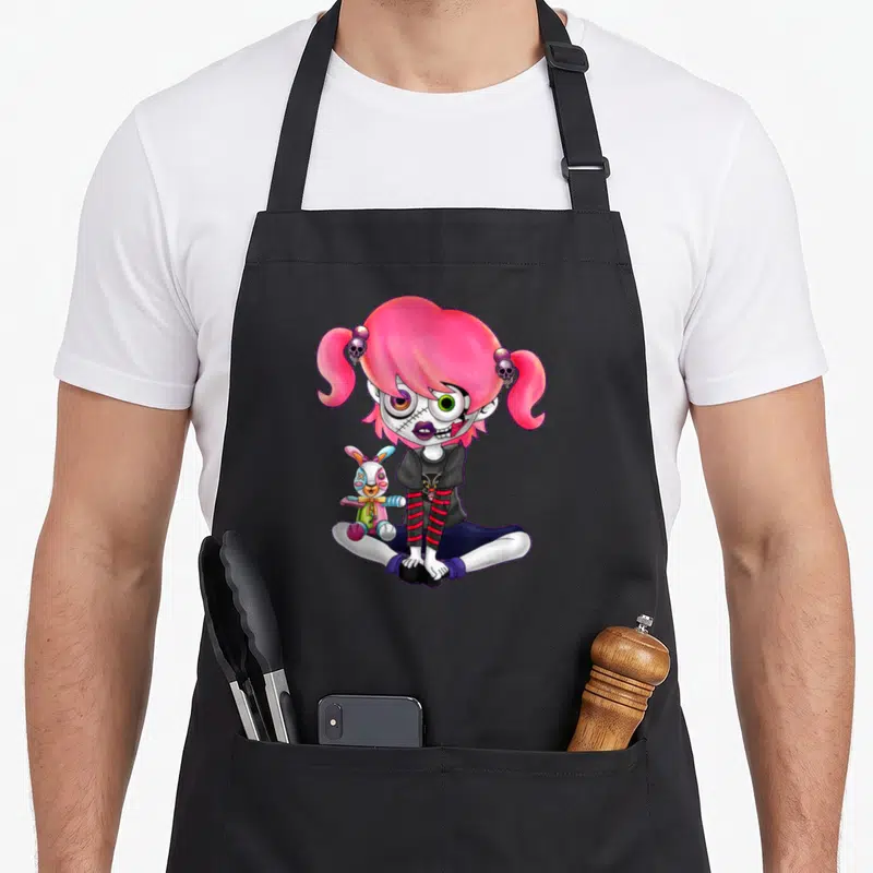 Tablier de cuisine noir avec une E Girl aux cheveux roses tenant un lapin gothique et des crânes dans ses nattes.