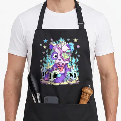 Tablier de cuisine noir avec ours patchwork violet, flammes bleues et têtes de mort colorées.