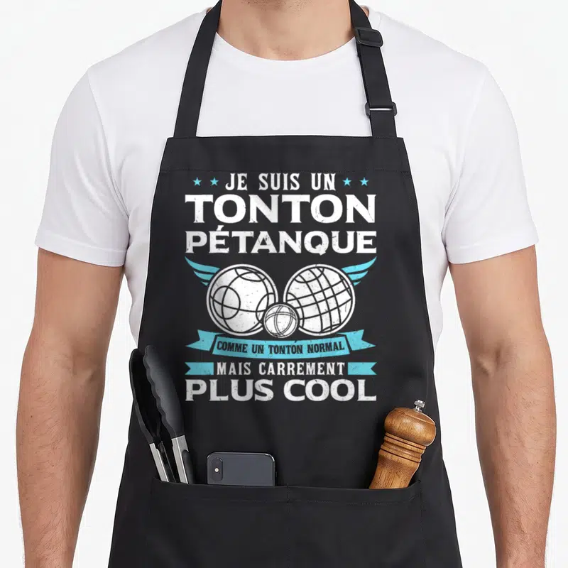 Tablier de cuisine noir avec illustration de boules de pétanque et texte Je suis un tonton pétanque plus cool.