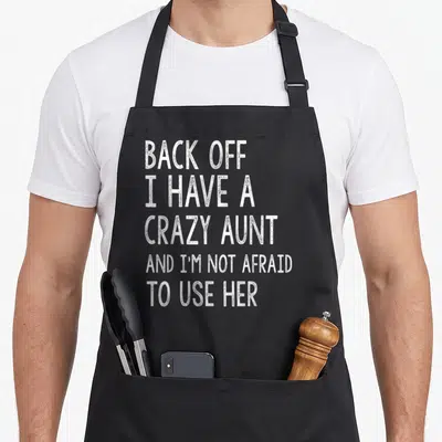 Tablier de cuisine noir avec texte blanc Back off I have a crazy aunt and I'm not afraid to use her