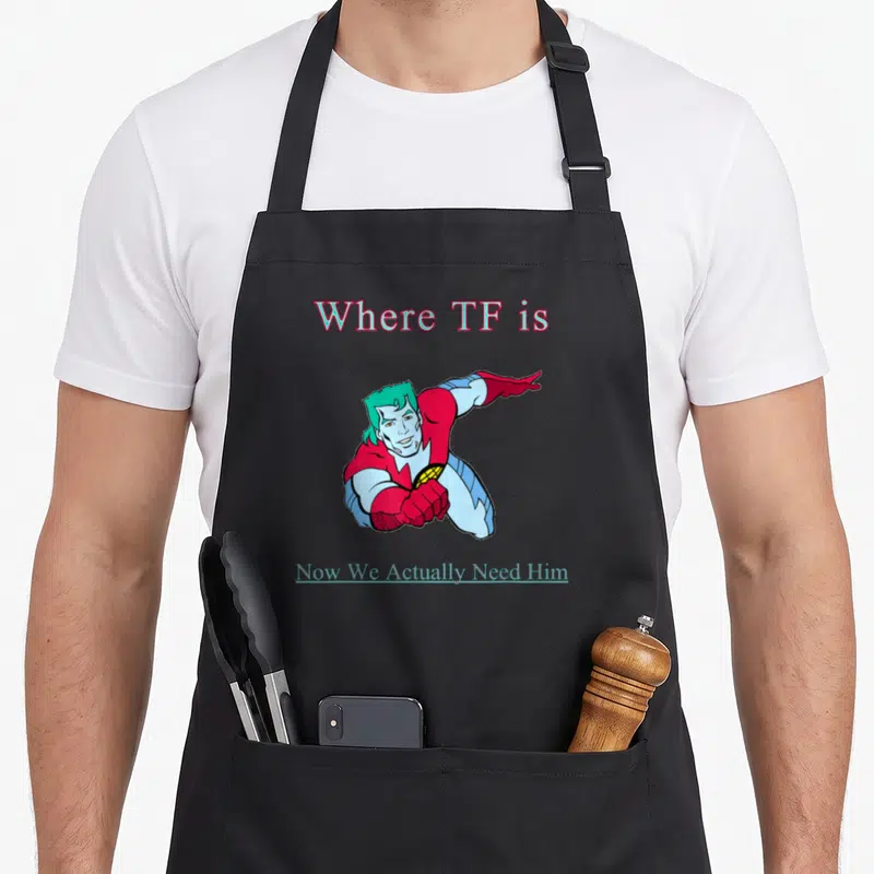 Tablier de cuisine noir avec illustration super-héros et texte Where TF is Now We Actually Need Him