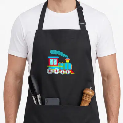 Tablier de cuisine noir avec une illustration de train à vapeur multicolore et fumée bleue stylisée.