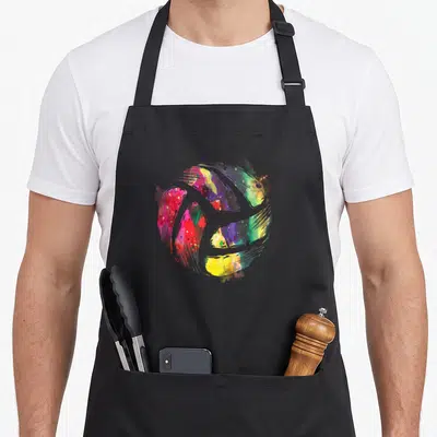 Tablier de cuisine noir avec illustration circulaire abstraite aux couleurs vives évoquant un sport d'entraînement de volleyball d'équipe