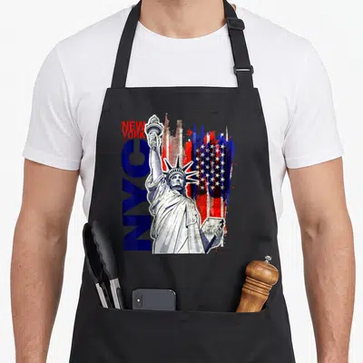 Tablier de cuisine noir avec Statue de la Liberté, drapeau USA et texte NYC bleu rouge