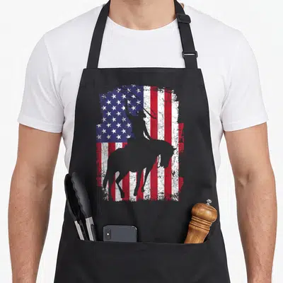 Tablier de cuisine noir avec silhouette cowboy sur fond drapeau américain déstructuré