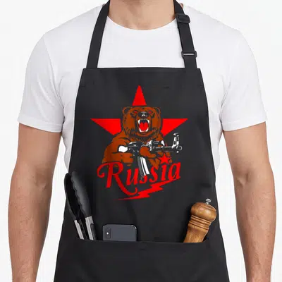 Tablier de cuisine noir avec illustration d'ours tenant un fusil Kalashnikov sous une étoile rouge et le mot Russia