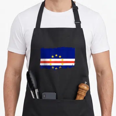 Tablier de cuisine noir avec le drapeau de Cap-Vert aux étoiles jaunes et bandes colorées au centre.
