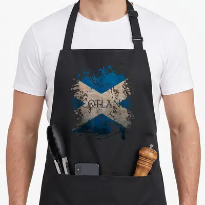 Tablier de cuisine noir avec drapeau Écosse bleu et blanc style éclaboussure et texte SCOTLAND
