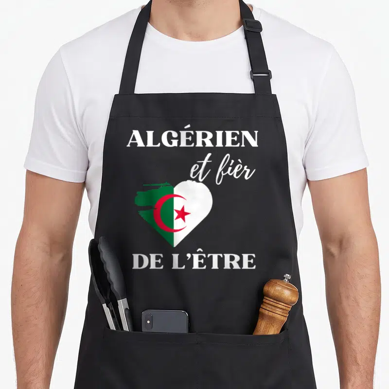 Tablier de cuisine noir avec un cœur stylisé aux couleurs du drapeau algérien et texte blanc
