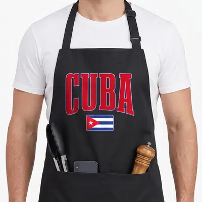 Tablier de cuisine noir avec l'inscription CUBA en lettres rouges et le drapeau national ci-dessous.