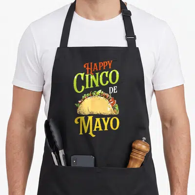 Tablier de cuisine noir avec illustration de taco et texte Happy Cinco De Mayo Mayo en couleurs vives.