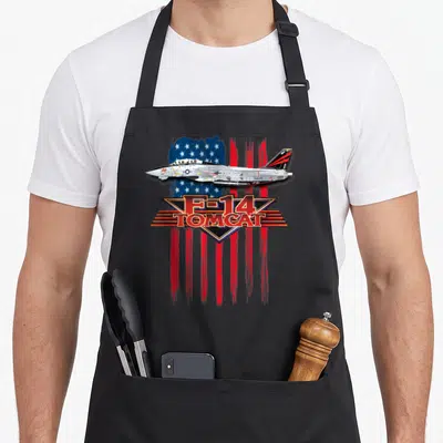 Tablier de cuisine noir avec illustration d'un F-14 Tomcat sur fond de drapeau américain stylisé.