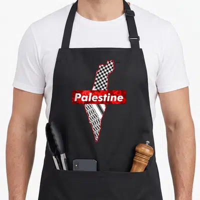 Tablier de cuisine noir avec carte Palestine Free Gaza, roses rouges et motifs géométriques noirs et blancs.