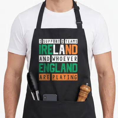 Tablier de cuisine noir avec inscription I Support 2 Teams Ireland and Whoever England Are Playing en vert, blanc et orange.
