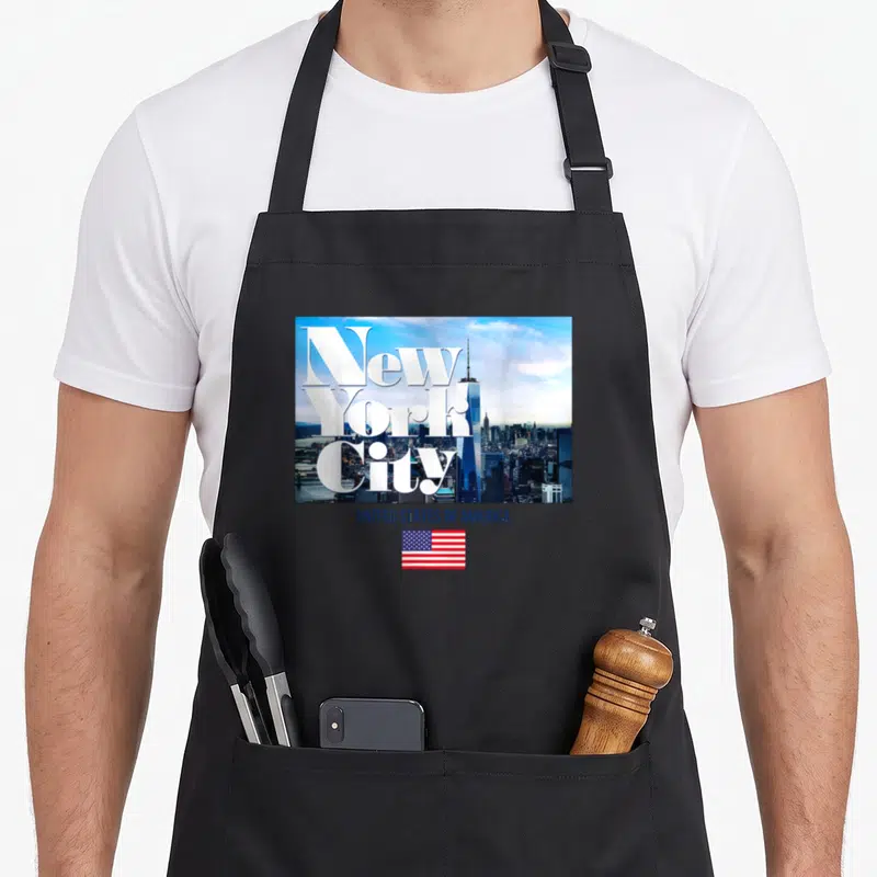 Tablier de cuisine noir avec skyline New York City texte blanc et drapeau USA en bas
