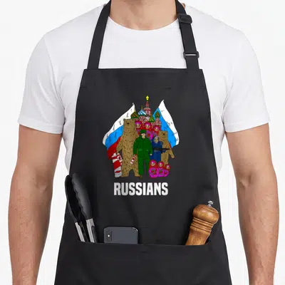 Tablier de cuisine noir avec ours, matryoshkas, soldat, cathédrale et drapeau russe sous le mot RUSSIANS.