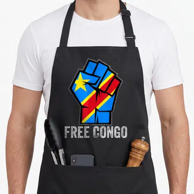 Tablier de cuisine noir avec un poing fermé aux couleurs du drapeau congolais et le texte Free Congo en bas.